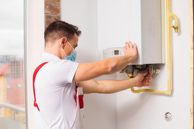 plumber-medical-mask-works-during-pandemic_290431-22982